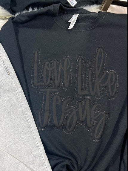 Black puff and glitter vinyl graphic tee with the text 'LOVE LIKE JESUS' printed on the front.