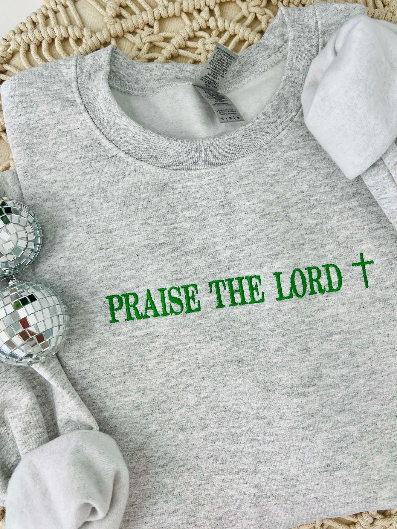 Ash sweatshirt with praise the Lord in green embroidery